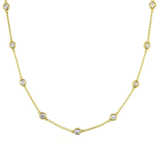 Diamonds by the yard necklace in yellow gold with bezel set round diamonds