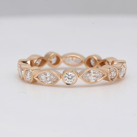 Eternity band in 14K RG with alternating bezel set round & marquise diamonds